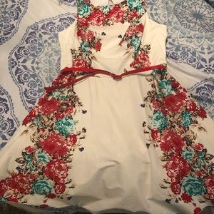 Sleeveless skater A-line mini with cutout back opening